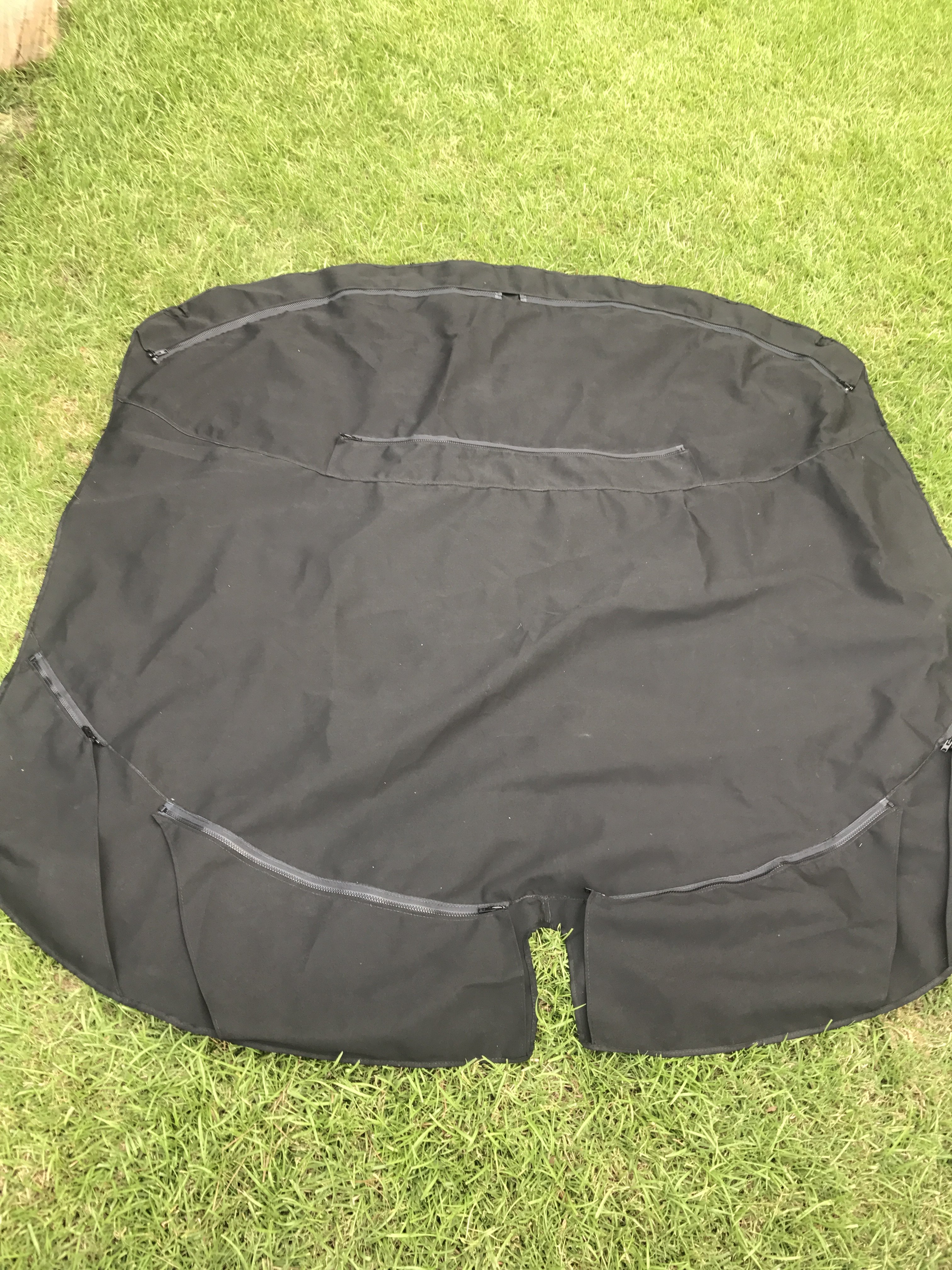 Bimini replacement in black Sunbrella with added zippers.