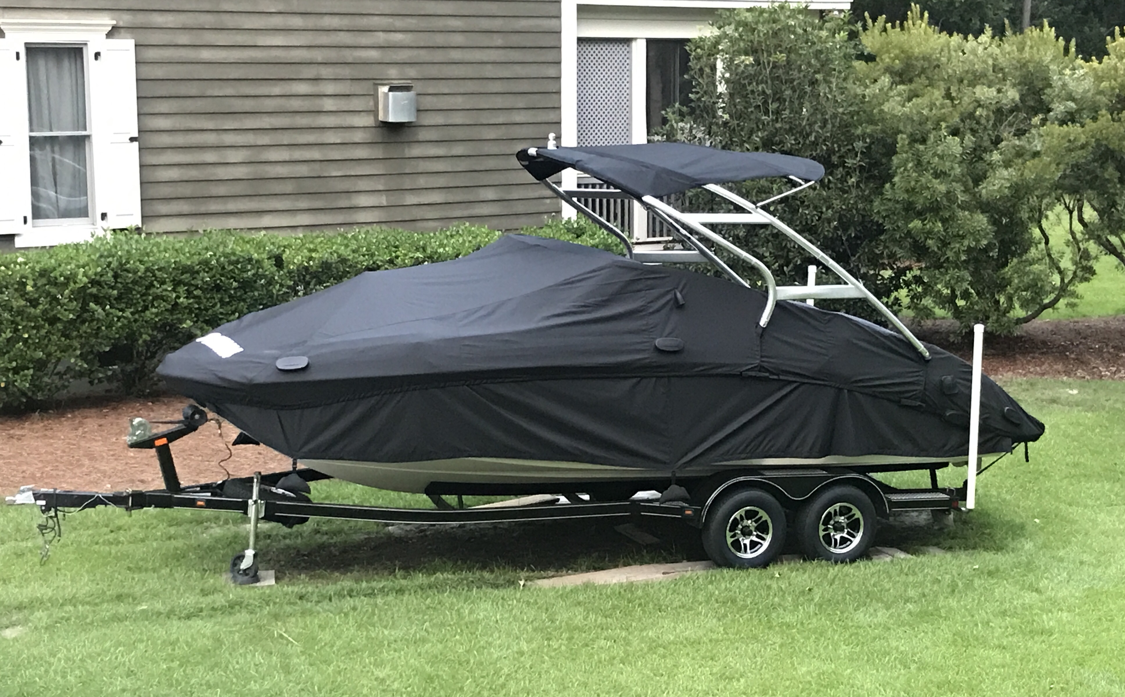 Bimini replacement in black Sunbrella with added zippers.