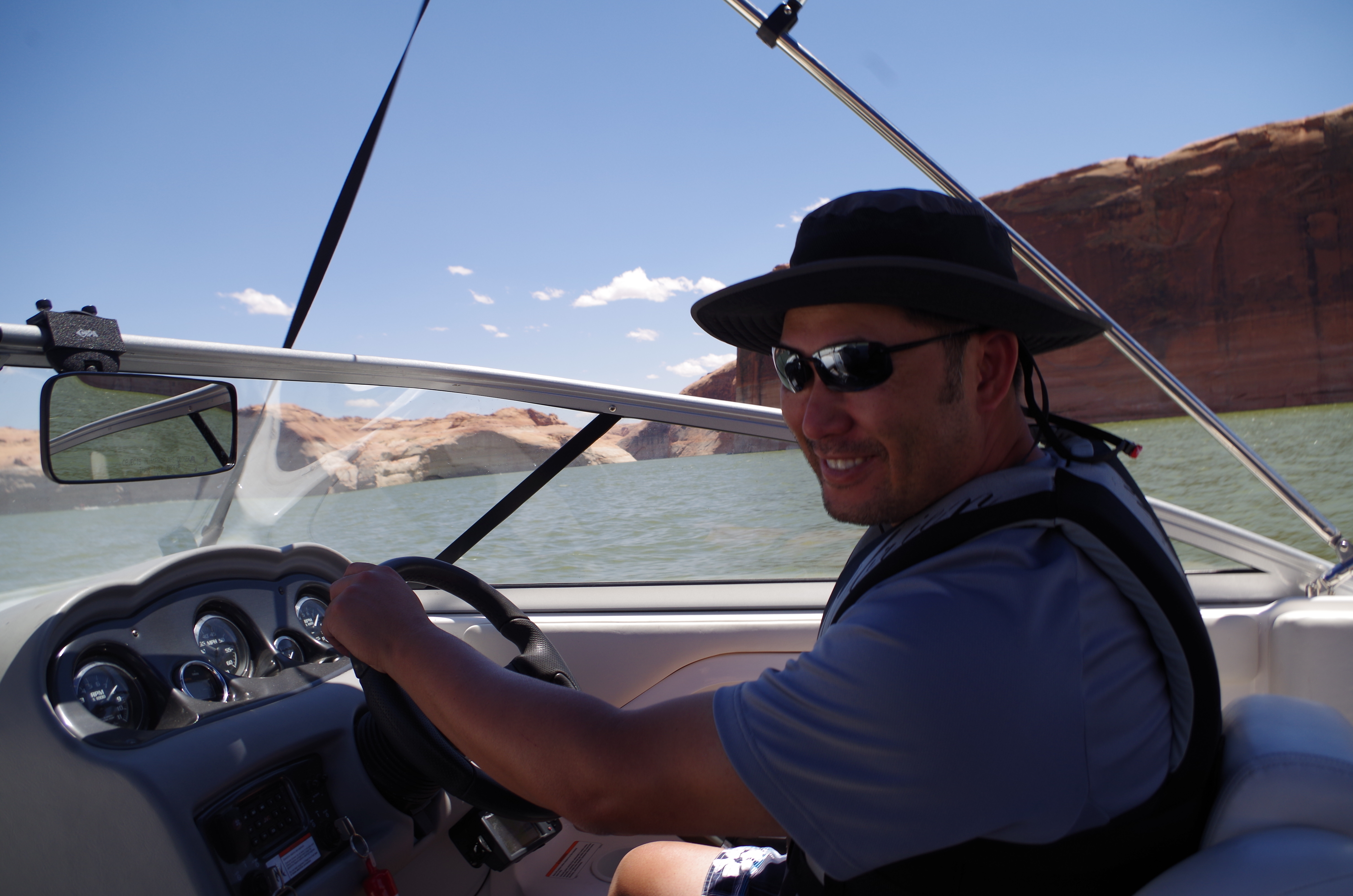 Mark driving a boat for the first time